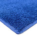 A vibrant cobalt blue carpet runner with a complementing blue binding on the edges. The carpet is made of plush material and is perfect for adding a pop of color and personality to any special event.